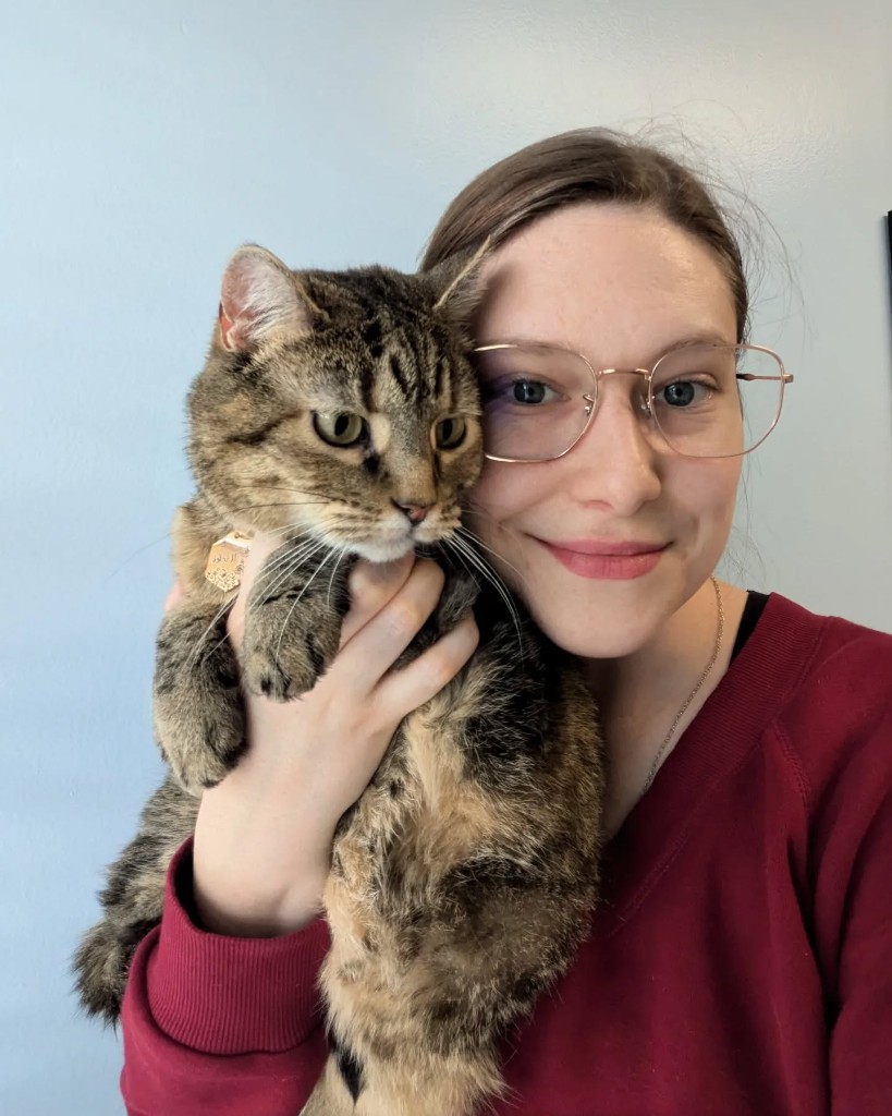 Rachel with a tabby cat